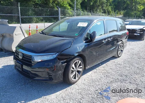 2021 Honda Odyssey Touring z USA, uszkodzony, nr VIN 5FNRL6H84MB027396